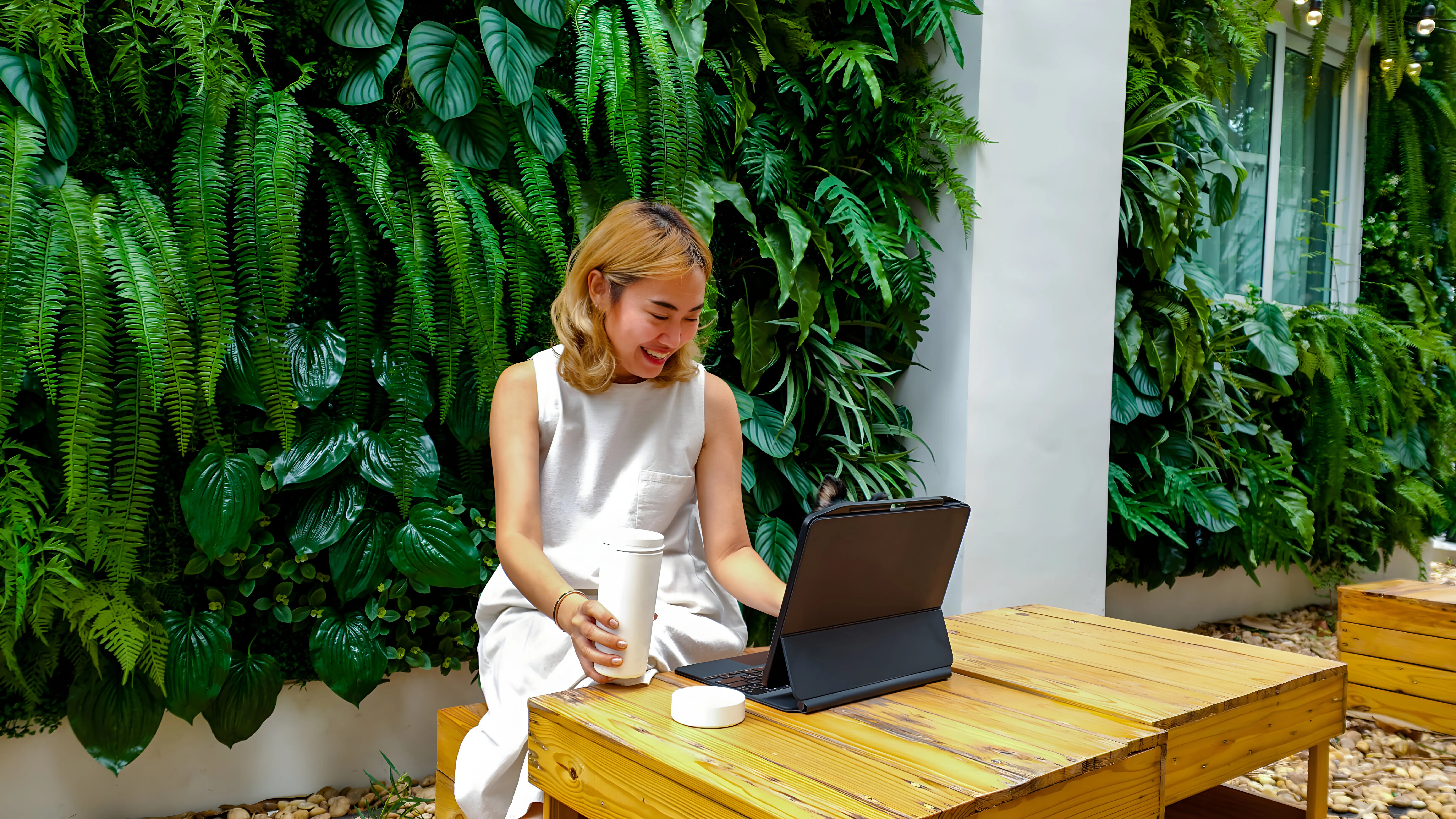 An Asian businesswoman working on office tasks at home.